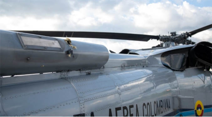Atacan con disparos el helicóptero presidencial de Colombia (Fotos)