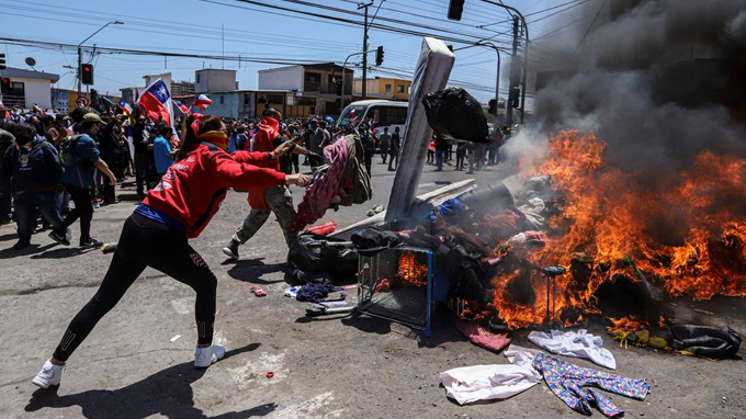 CIDH llama a adoptar medidas urgente por “actos violentos y xenófobos” a venezolanos en Chile