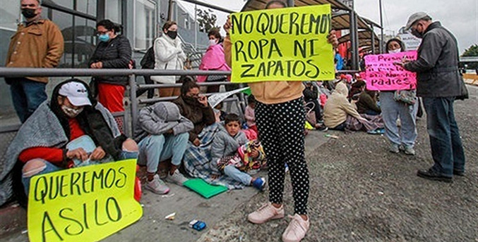 Miles de migrantes protestan para exigir asilo en la frontera sur de México