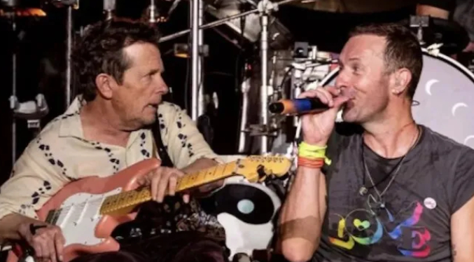 Coldplay sorprende a sus fans al invitar a Michael J. Fox al escenario (Video)