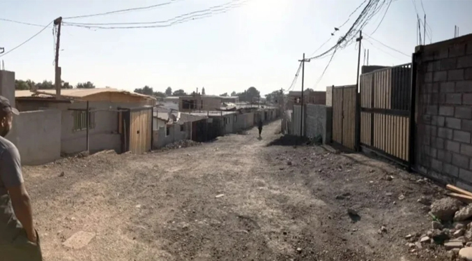 Habitantes de una comuna ilegal en Chile improvisan medidas de seguridad tras muerte de venezolano